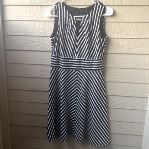 Beautiful black and black strip White/ House black market dress. Size 4.